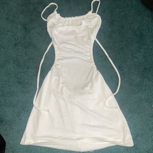 White open-back tied dress